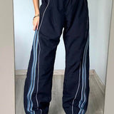 Pantalon parachute bleu