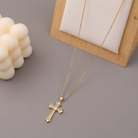 collier-annee-90-vintage-a-pendentif-croix